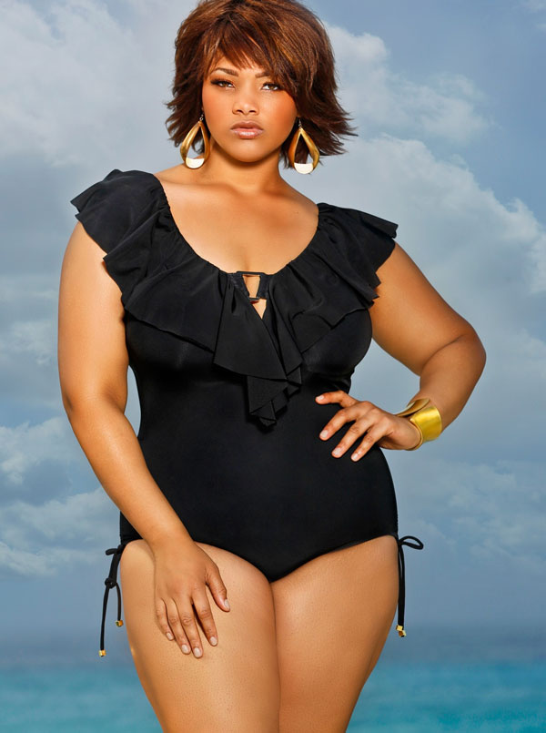 This black ruffle top swimsuit is from Monif C.