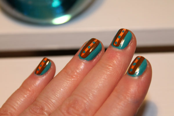 Orange and teal nail art with Julep polish.