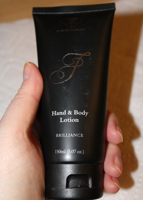 The black tube of Forever Diamonds hand and body lotion.